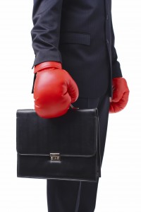 business man with boxing gloves