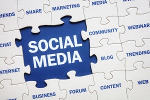 Social media concept jigsaw piece reading marketing, networking, community, internet etc