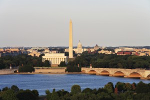 The Washington, DC skyline showing the Potomac River, Memorial Bridge, US Capitol, Washington Monument and Lincoln Memorial.